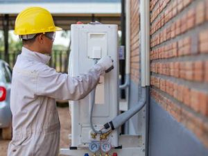 H V A C Technician performing a residential tuneup