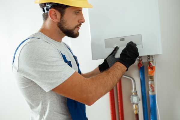 Tennessee heating technician performing home maintenance